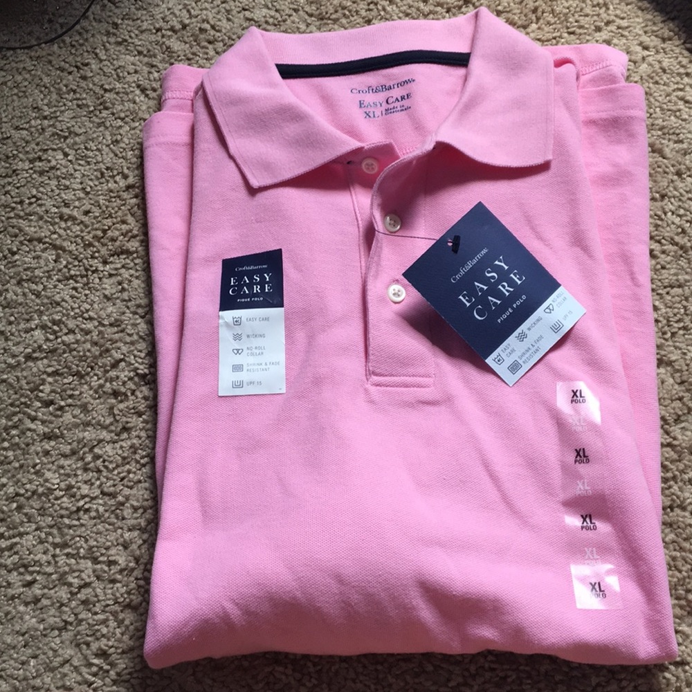 NWT men’s XL pink polo shirt.